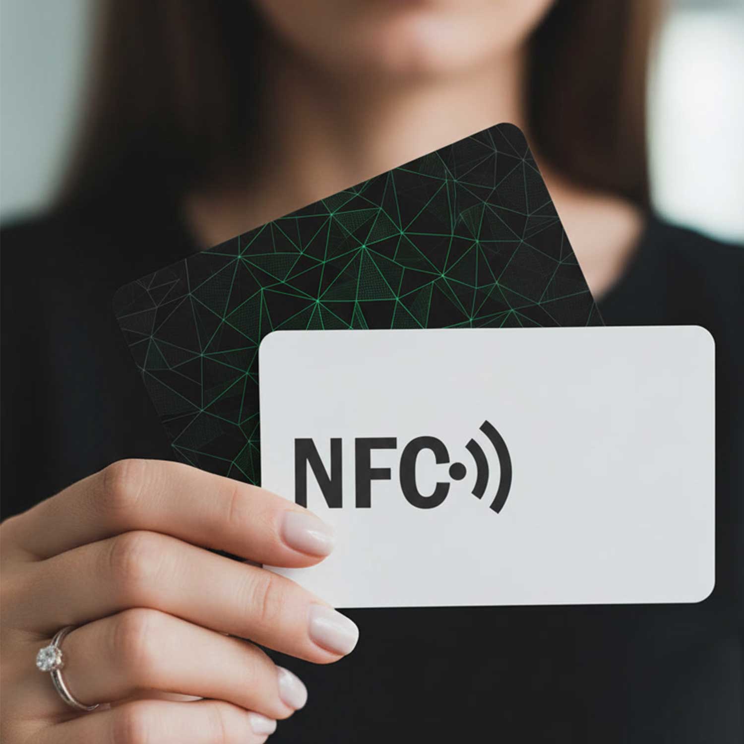 Printed NFC membership card held in a hand